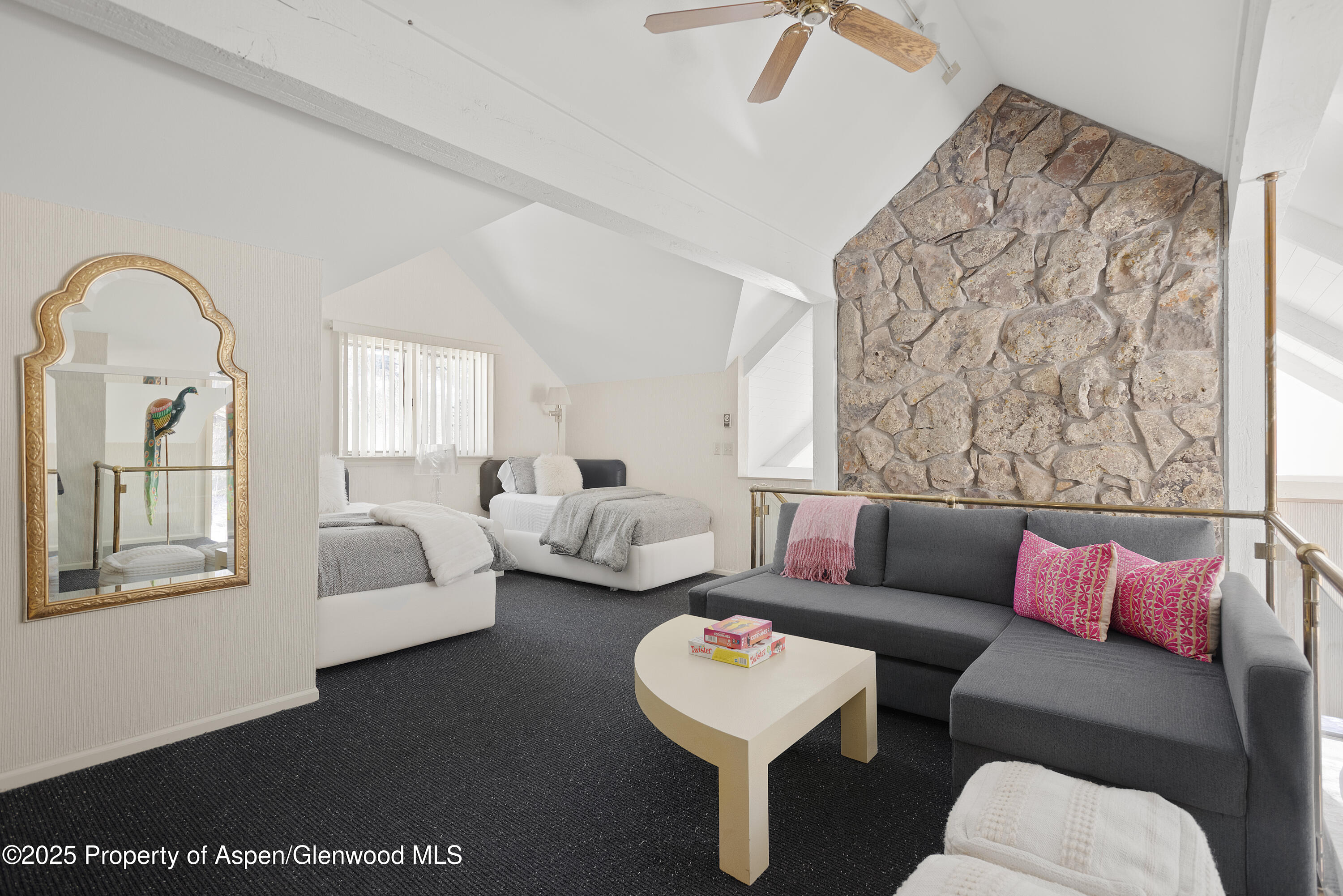 60 Northway Drive Aspen, CO 81611 - Photo 19 of 32 a living room with furniture and a large window