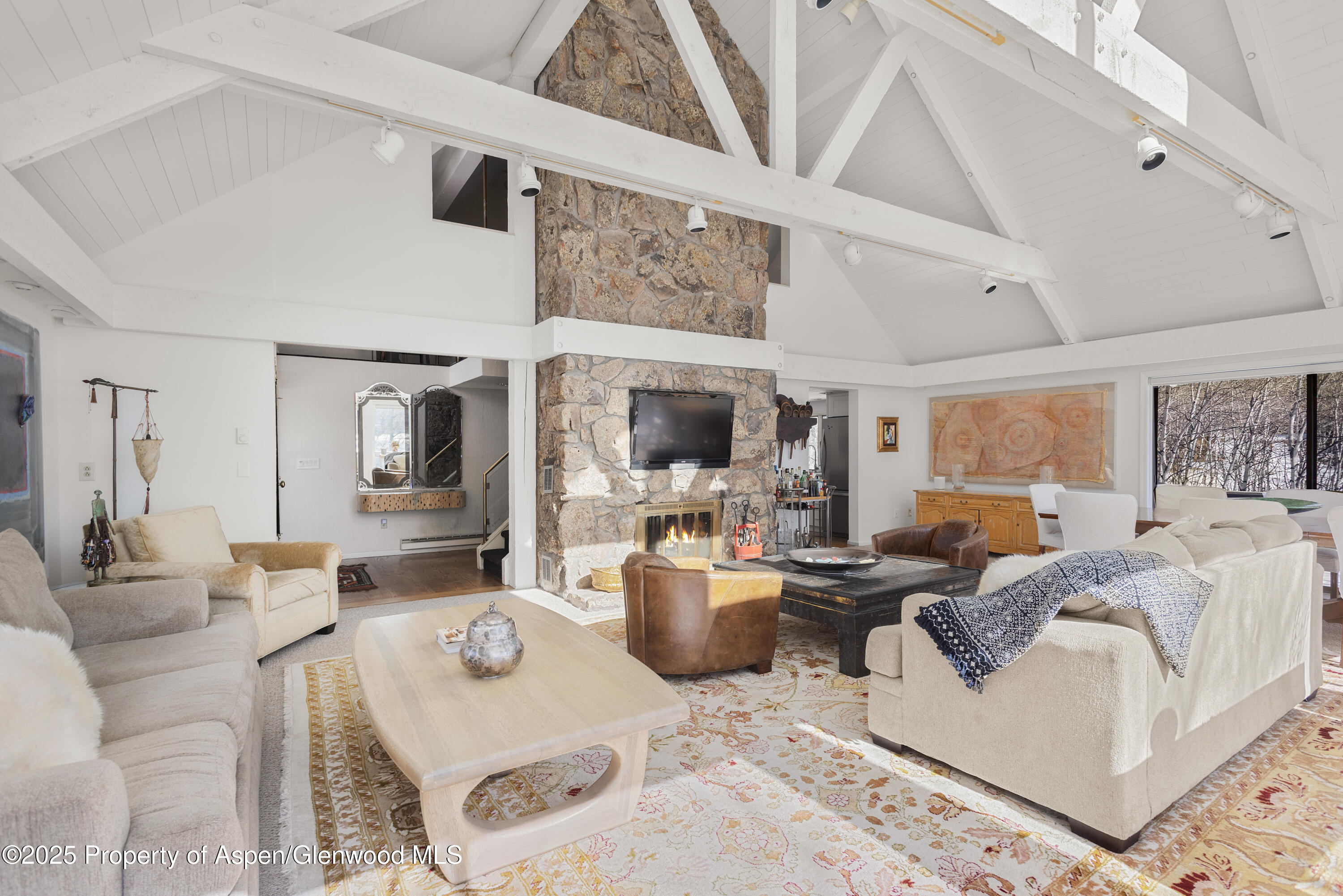 60 Northway Drive Aspen, CO 81611 - Photo 2 of 32 a living room with furniture and a large window