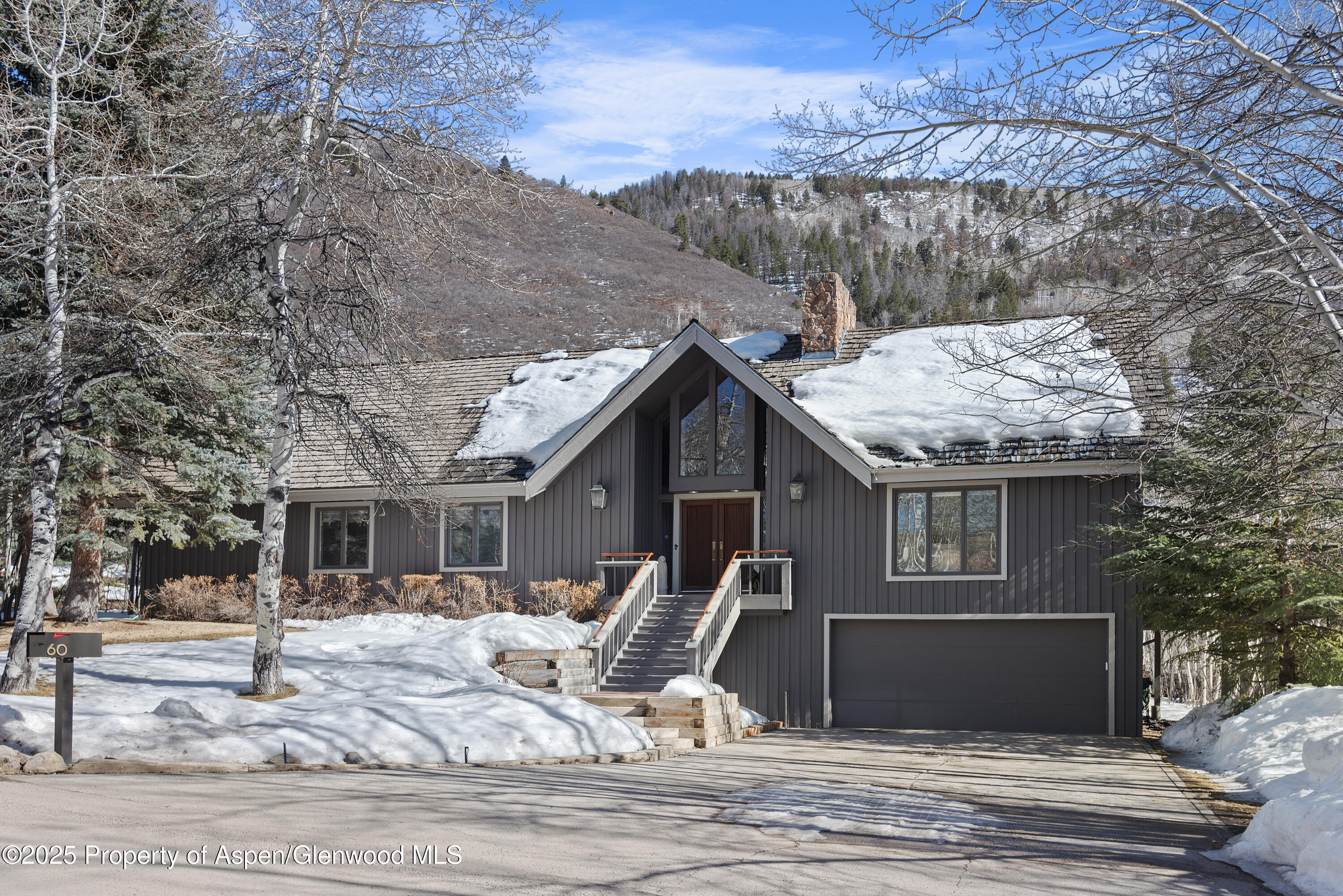 60 Northway Drive Aspen, CO 81611 - Photo 25 of 32 a view of a house with a patio