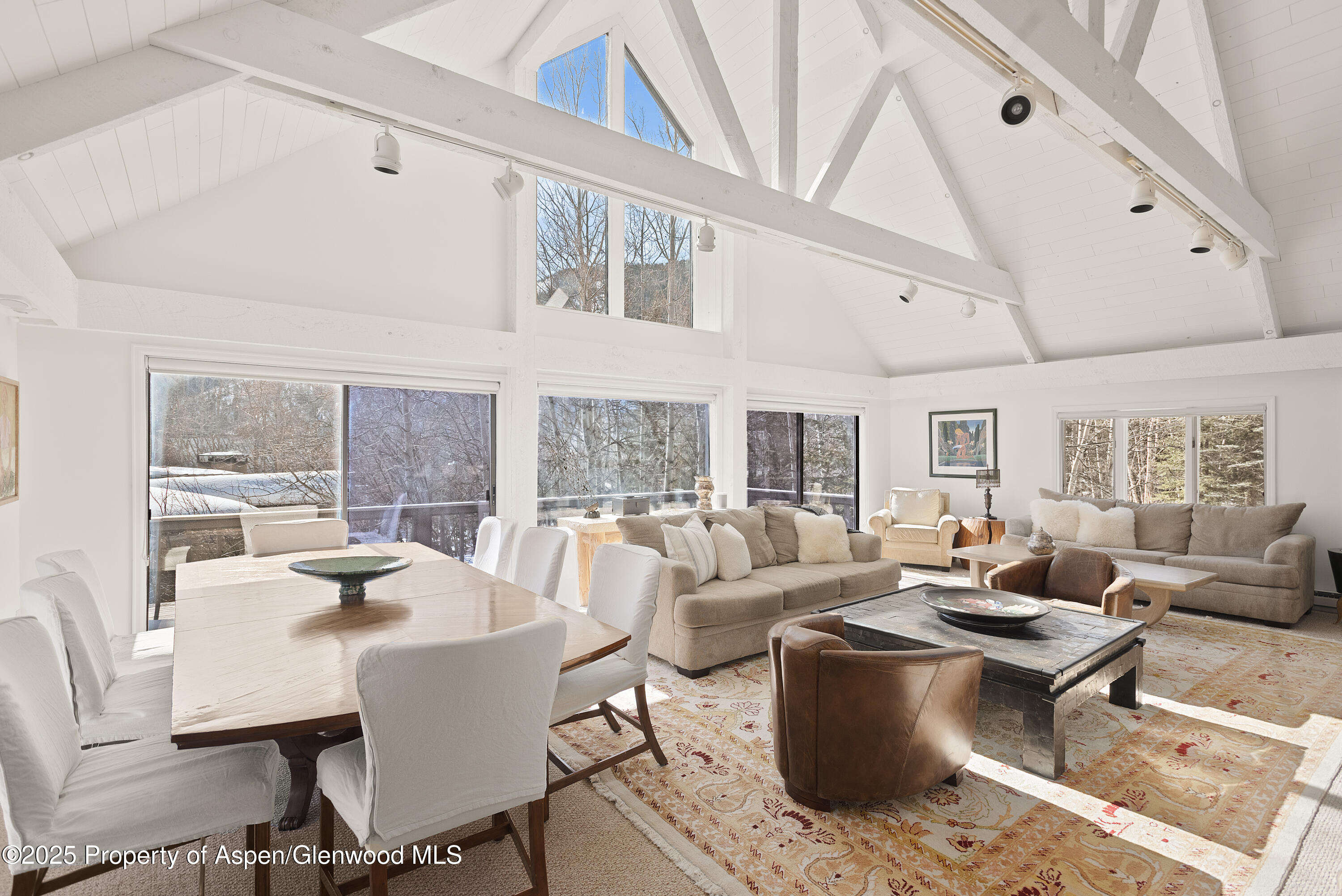 60 Northway Drive Aspen, CO 81611 - Photo 5 of 32 a living room with furniture and a large window