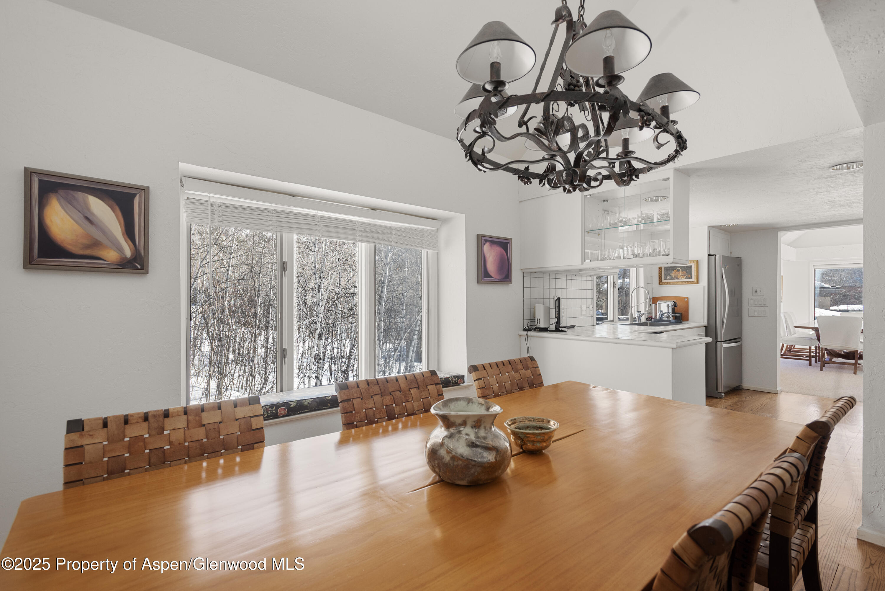 60 Northway Drive Aspen, CO 81611 - Photo 9 of 32 a living room with furniture and a large window