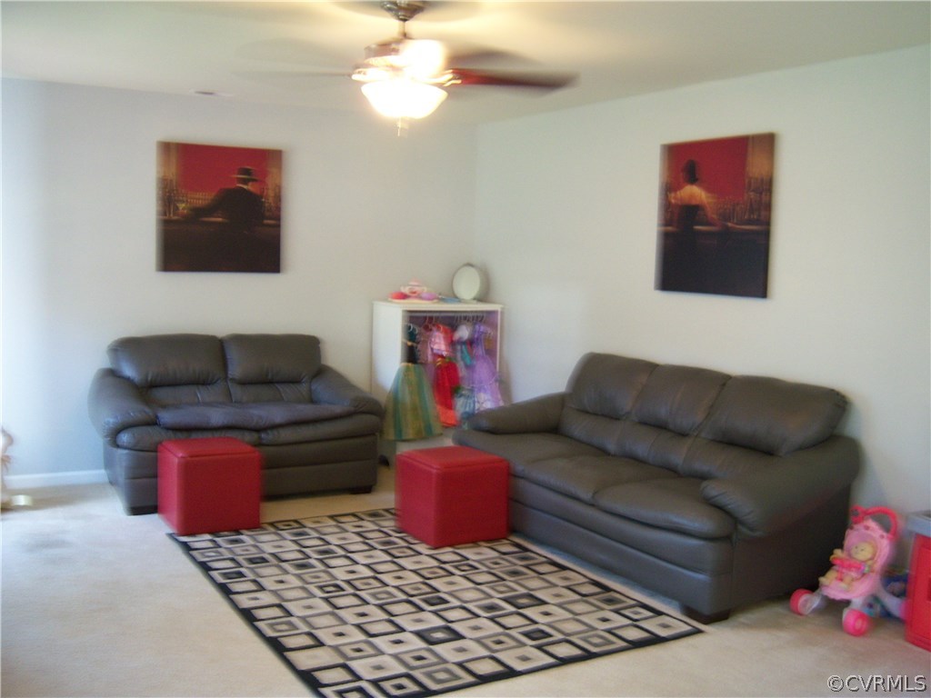 2115 Pemberton Road Henrico, VA 23238 - Photo 12 of 33 a living room with furniture and a rug