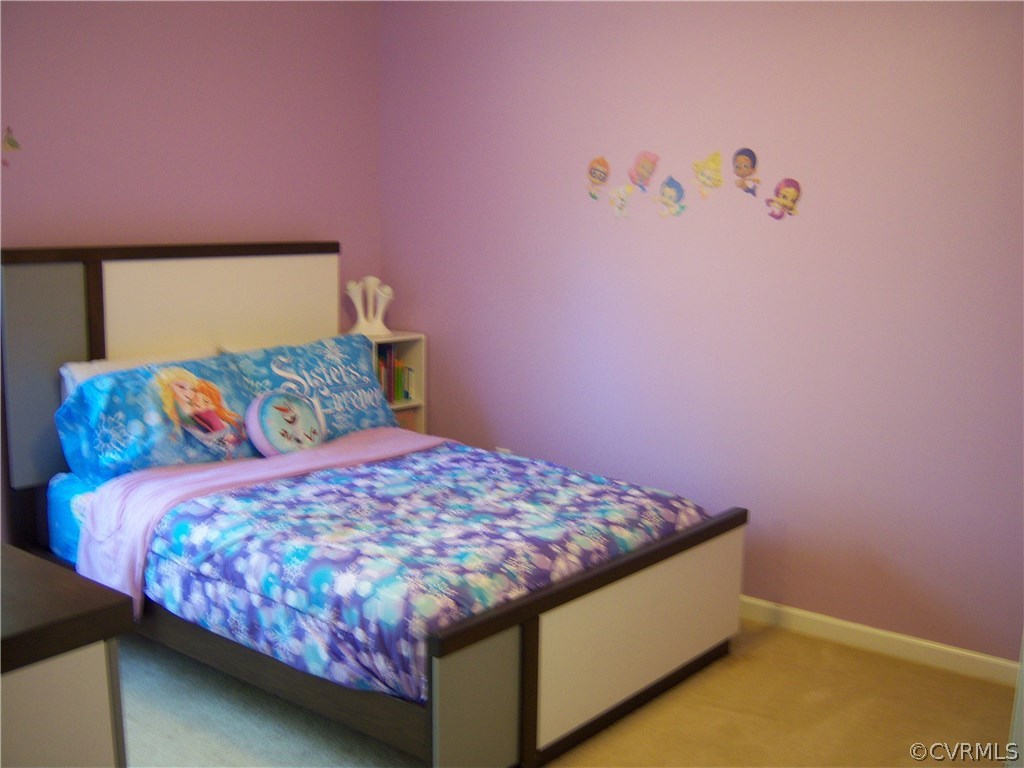 2115 Pemberton Road Henrico, VA 23238 - Photo 17 of 33 a bedroom with a bed and a painting on the wall