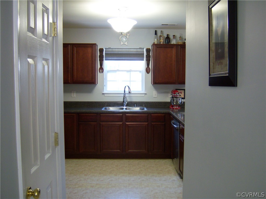2115 Pemberton Road Henrico, VA 23238 - Photo 6 of 33 a bathroom with a sink and a mirror