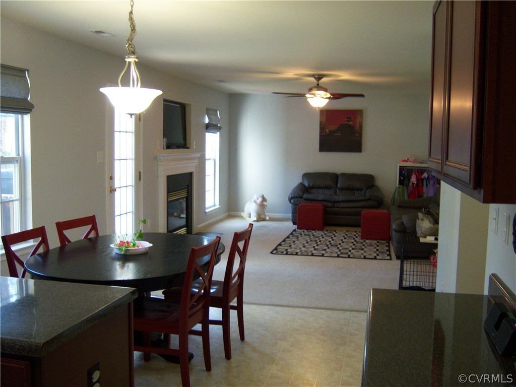 2115 Pemberton Road Henrico, VA 23238 - Photo 10 of 33 a dining room with furniture and chandelier