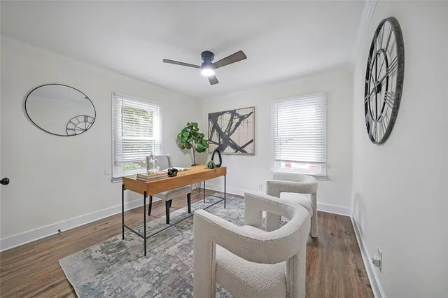 a workspace with furniture and window