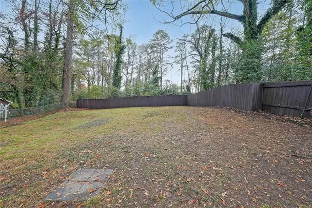 a view of backyard with tree