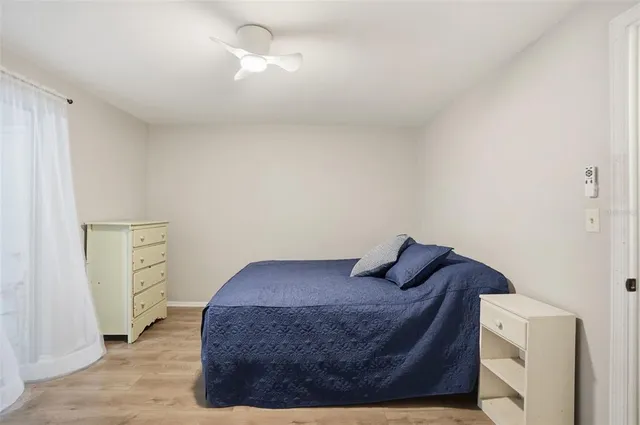 a bedroom with a bed and closet