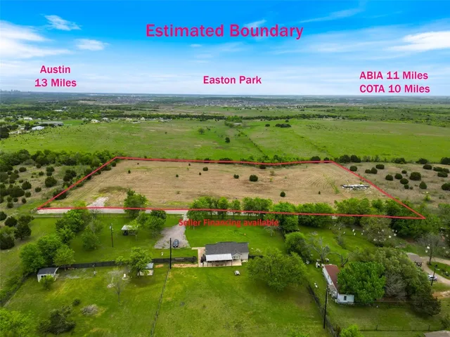 a sign that is sitting on a beach