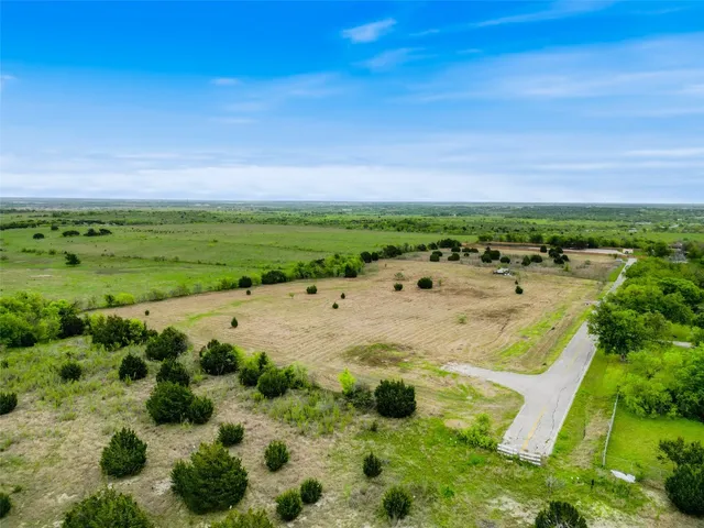 a view of a lake with a beach