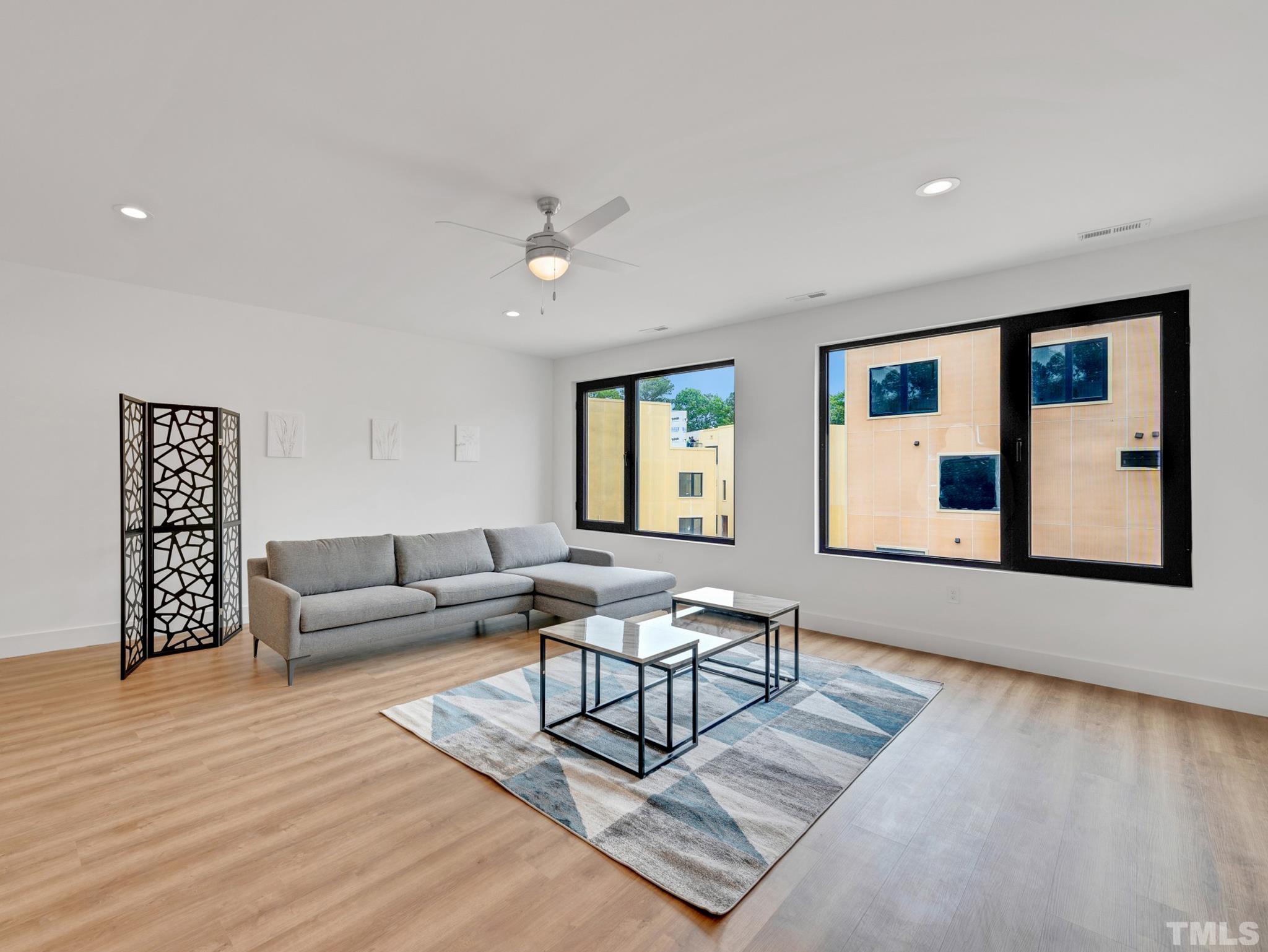 1115 Nova Street Durham, NC 27713 - Photo 9 of 56 a living room with furniture and wooden floor