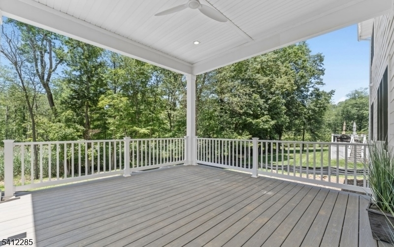 13 Penwood Road Livingston, NJ 07039 - Photo 15 of 18 a view of balcony with wooden floor