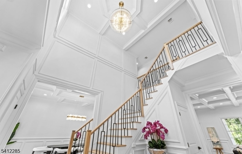13 Penwood Road Livingston, NJ 07039 - Photo 3 of 18 a view of entryway and hall with wooden floor