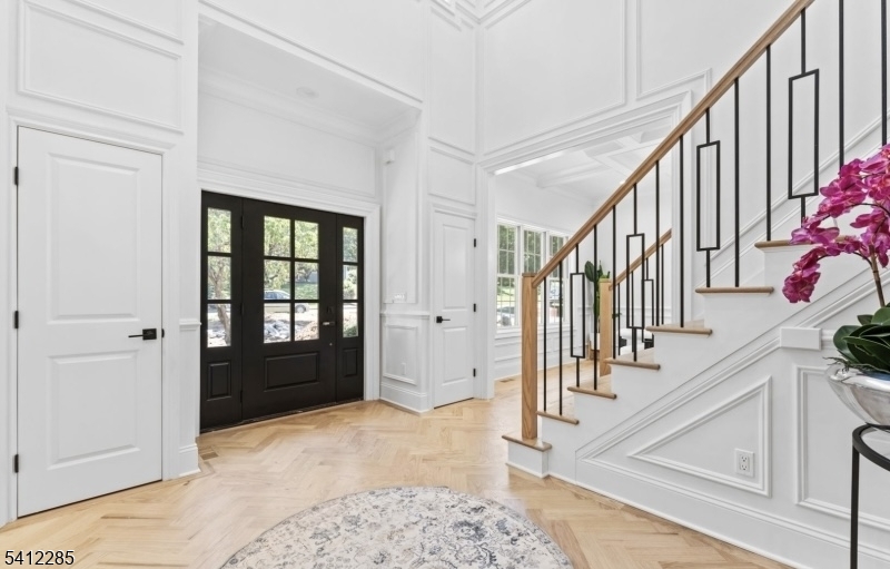 13 Penwood Road Livingston, NJ 07039 - Photo 4 of 18 a view of an entryway with staircase