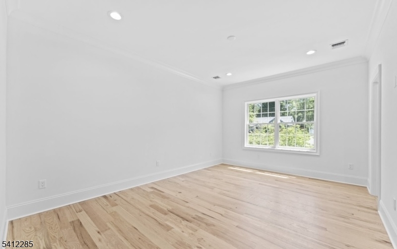 13 Penwood Road Livingston, NJ 07039 - Photo 9 of 18 an empty room with a window