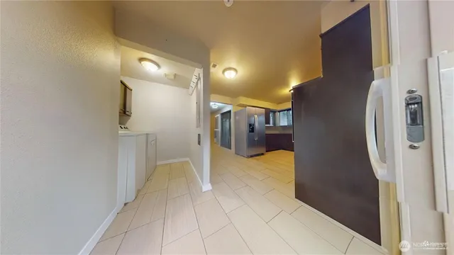 a view of a hallway with a furniture