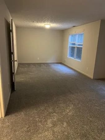 a view of a hallway with door