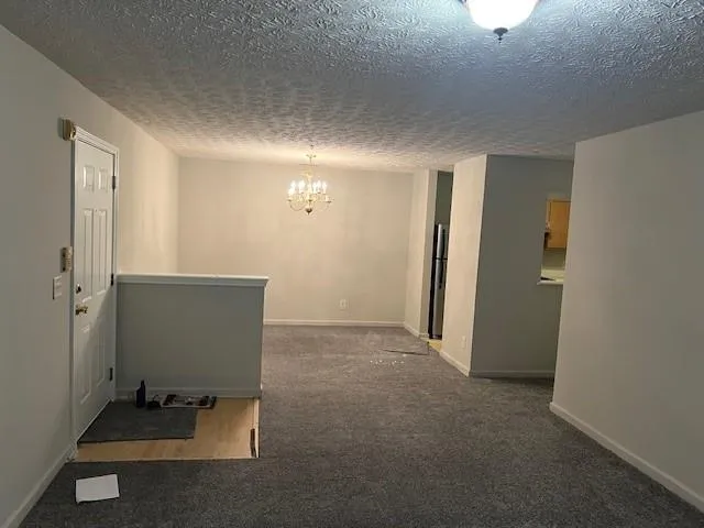 a view of livingroom with kitchen