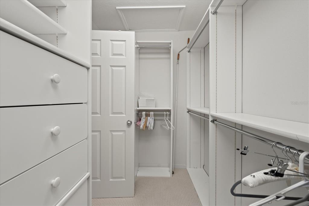 2254 Harbour Ct Drive Longboat Key, FL 34228 - Photo 14 of 57 a bathroom with a tub and shower