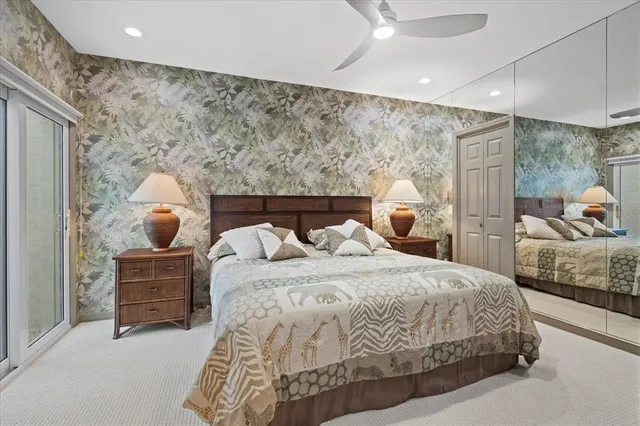 a bathroom with a bathtub shower sink and mirror