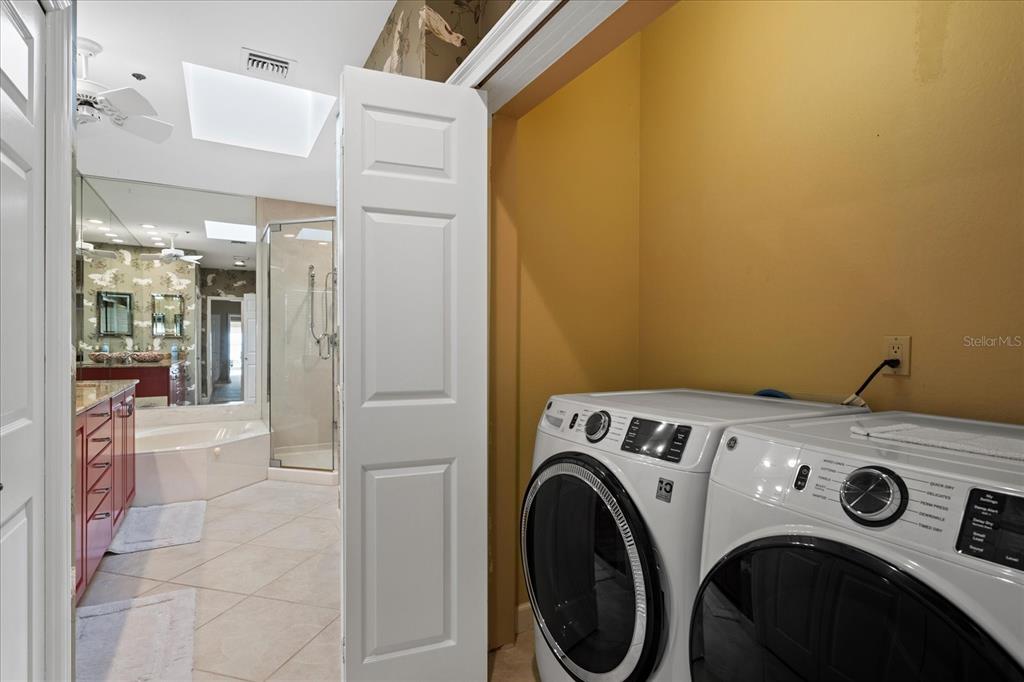 2254 Harbour Ct Drive Longboat Key, FL 34228 - Photo 22 of 57 a utility room with dryer and washer