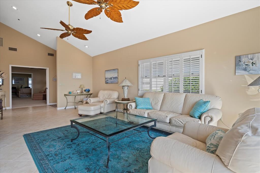 2254 Harbour Ct Drive Longboat Key, FL 34228 - Photo 32 of 57 a living room with furniture and a window