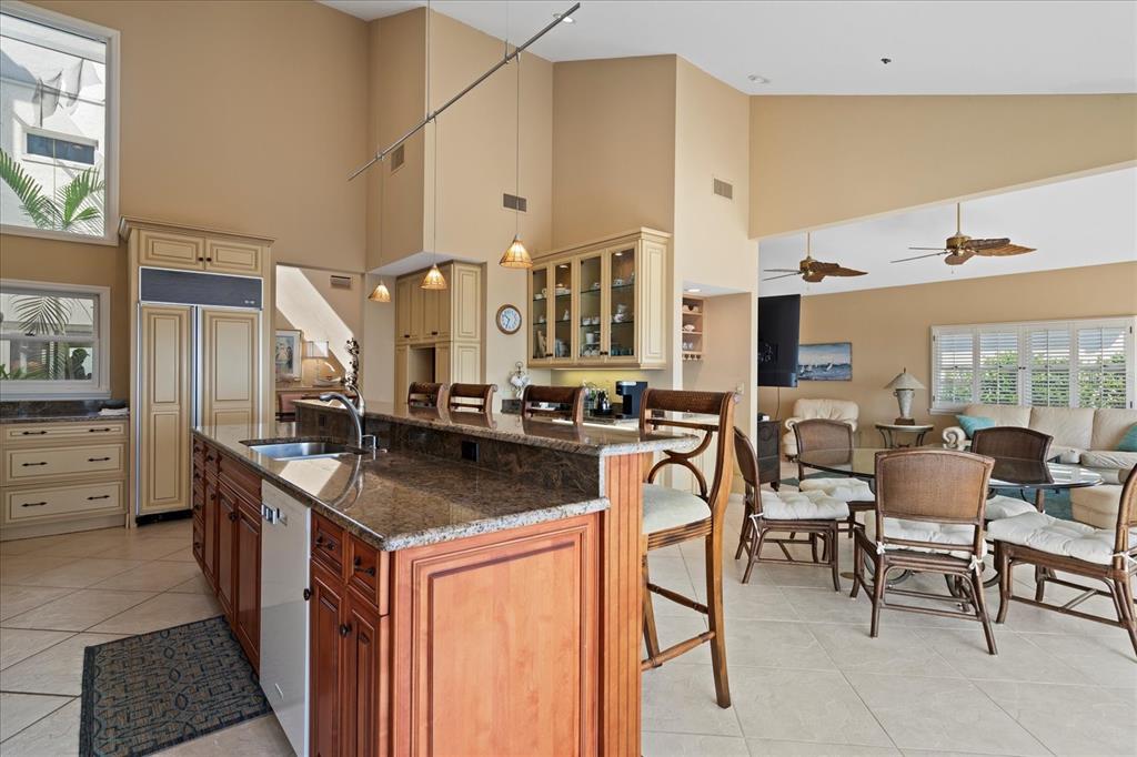 2254 Harbour Ct Drive Longboat Key, FL 34228 - Photo 36 of 57 a kitchen with stainless steel appliances granite countertop a sink and a refrigerator