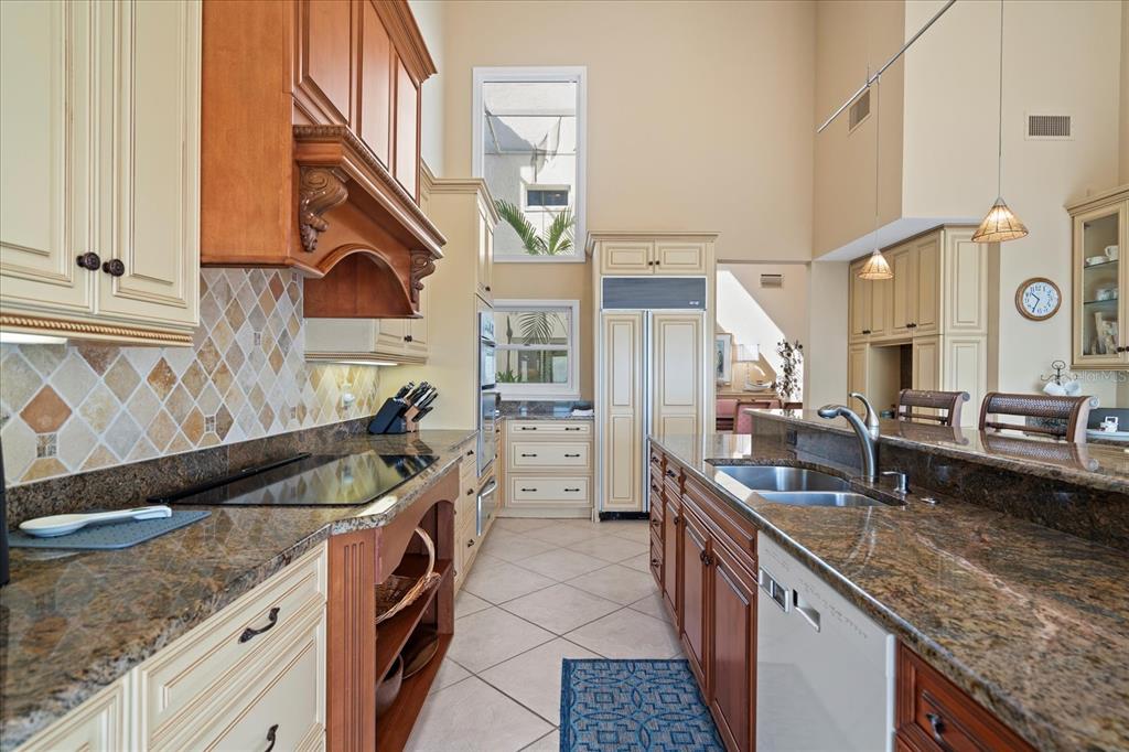 2254 Harbour Ct Drive Longboat Key, FL 34228 - Photo 37 of 57 a kitchen with a sink and stove