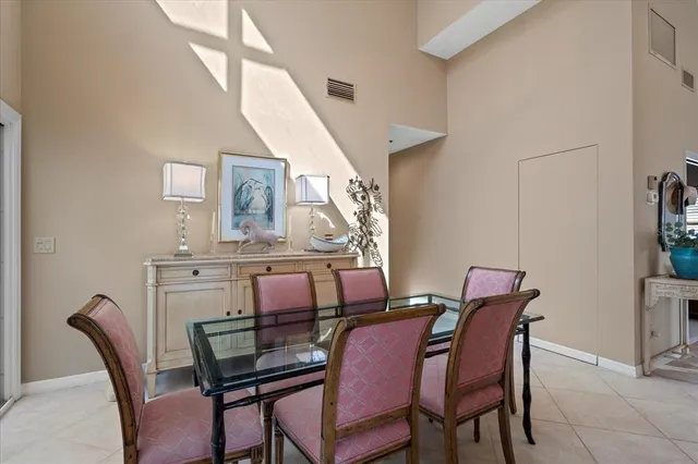 a bedroom with a bed and a flat screen television