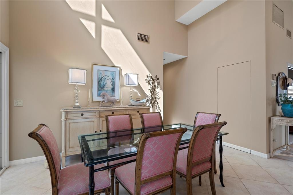 2254 Harbour Ct Drive Longboat Key, FL 34228 - Photo 42 of 57 a view of a dining room with furniture