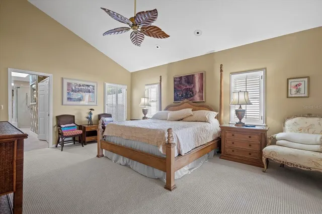a view of a chair and tables in the balcony