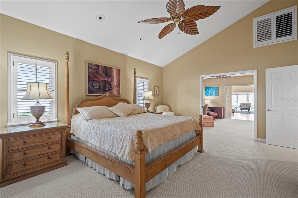 2254 Harbour Ct Drive Longboat Key, FL 34228 - Photo 50 of 57 a bedroom with a bed and window