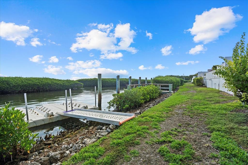 2254 Harbour Ct Drive Longboat Key, FL 34228 - Photo 6 of 57 a view of a garden