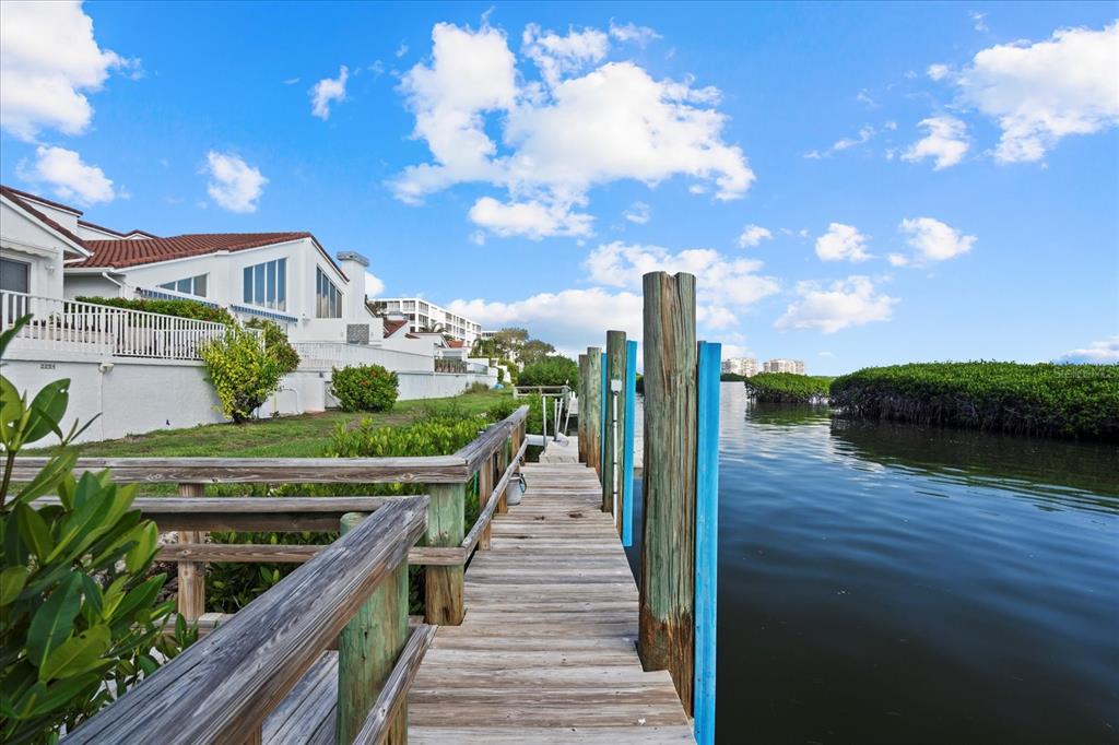 2254 Harbour Ct Drive Longboat Key, FL 34228 - Photo 8 of 57 a view of a house with wooden deck