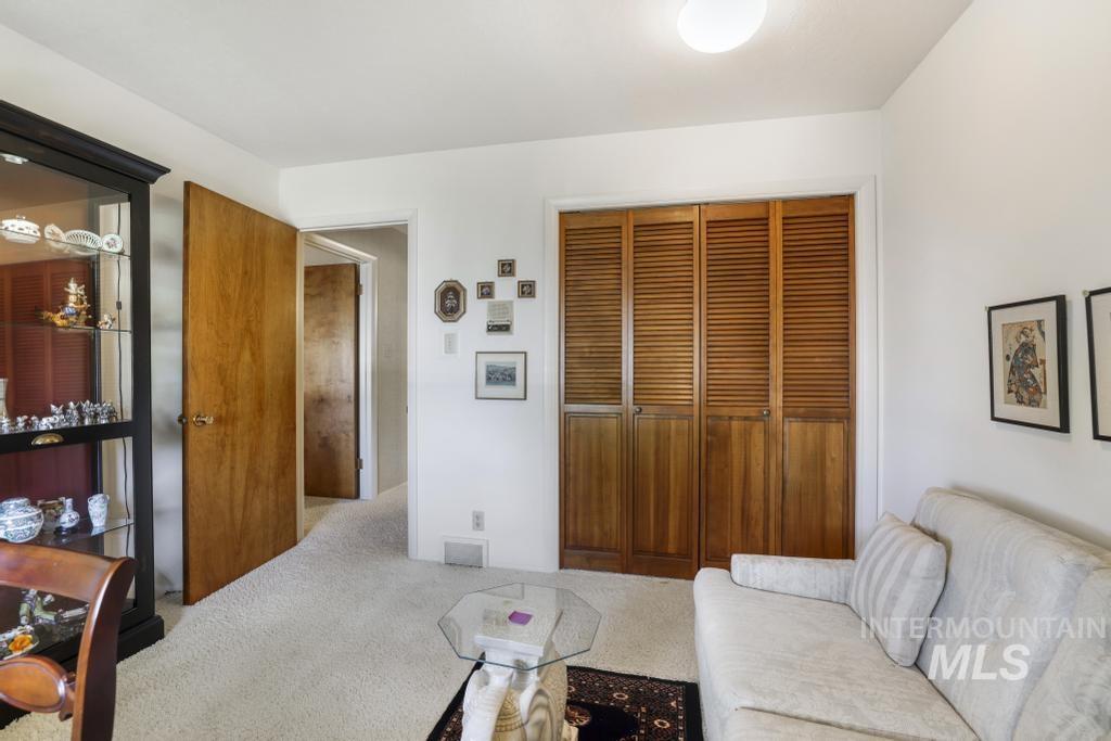 2018 Rancho Vista Drive Twin Falls, ID 83301 - Photo 33 of 50 Room featuring light-toned carpeting, white painted walls, and a ceiling-mounted light fixture