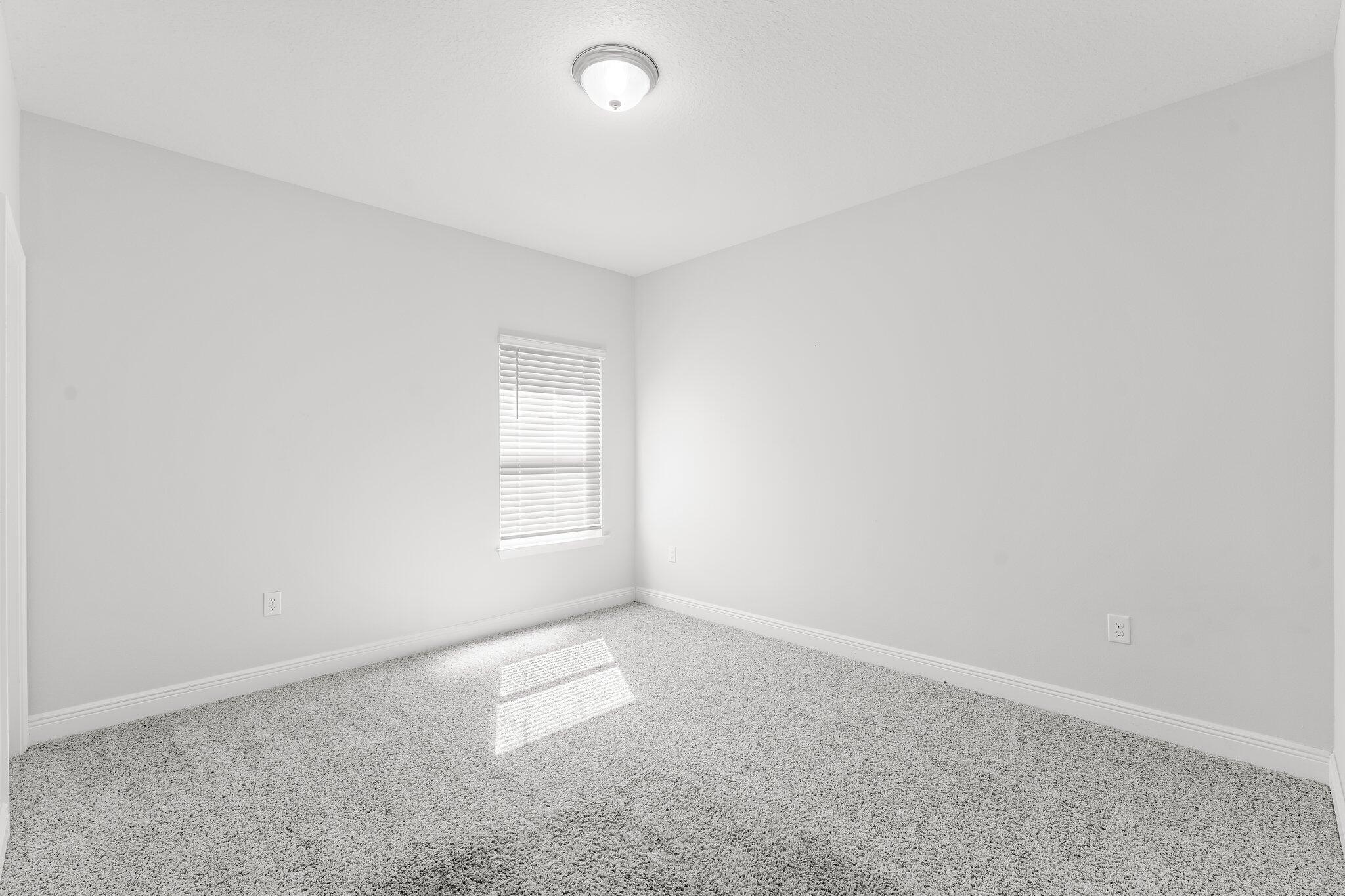 813 Cason Circle Panama City, FL 32405 - Photo 11 of 20 an empty room with a window