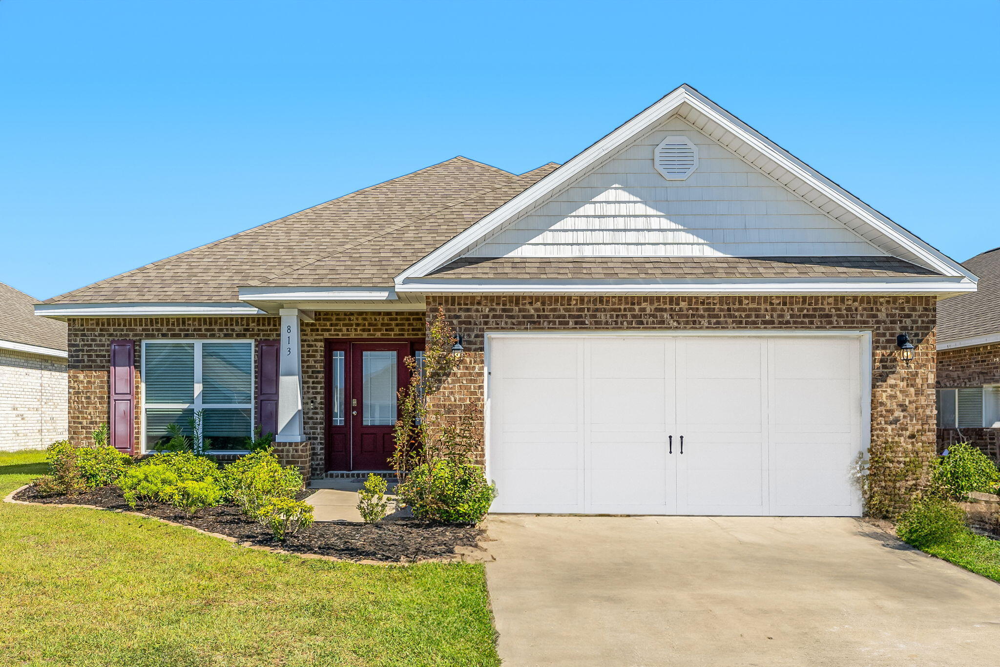 813 Cason Circle Panama City, FL 32405 - Photo 20 of 20 a front view of a house with garden