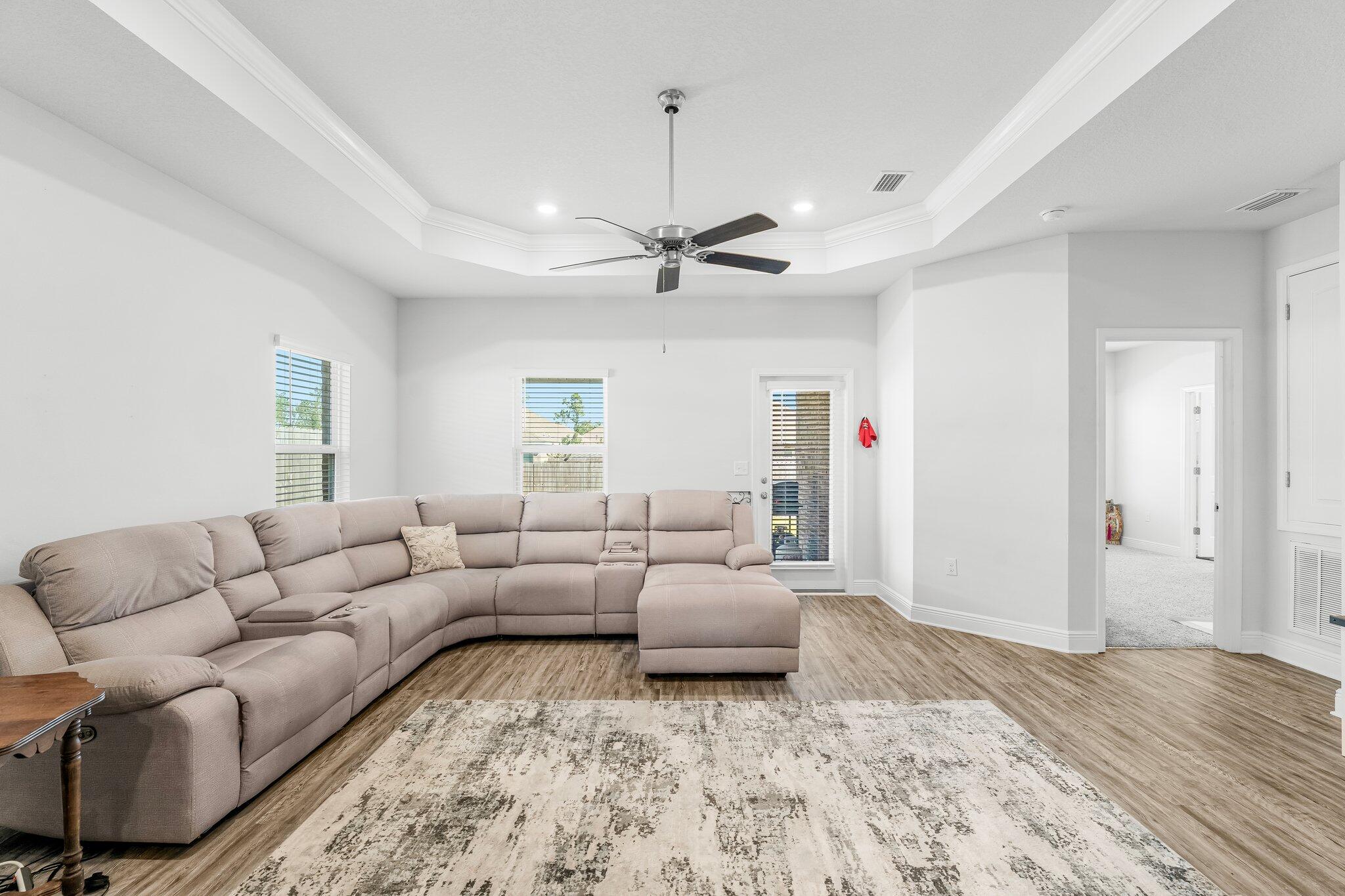 813 Cason Circle Panama City, FL 32405 - Photo 7 of 20 a living room with furniture and a ceiling fan