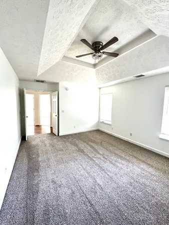 a view of an empty room and window