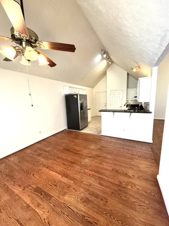 a view of a kitchen with a sink