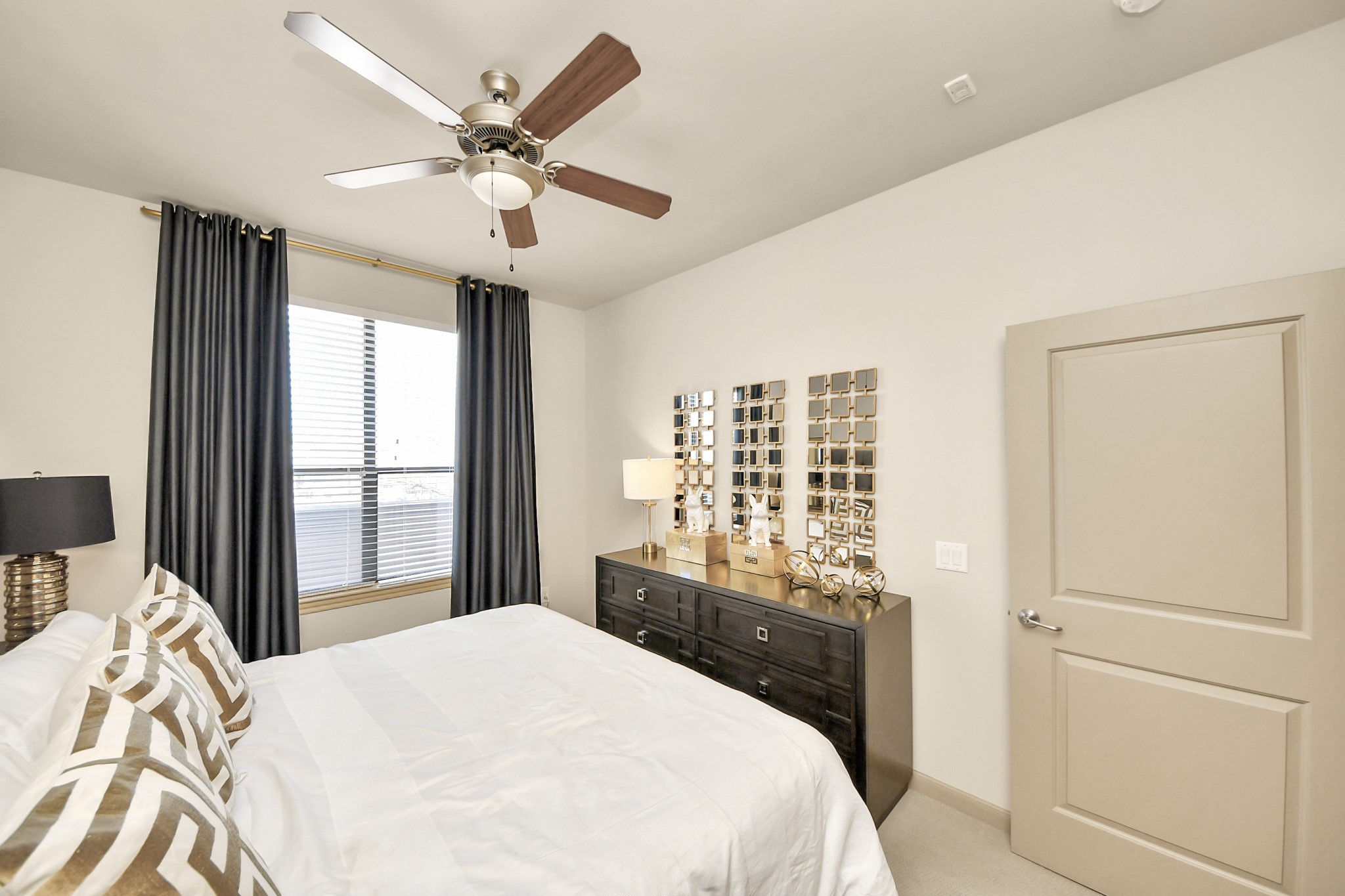 6363 San Felipe Street, Unit 314 Houston, TX 77057 - Photo 16 of 43 a bedroom with a large bed and a window