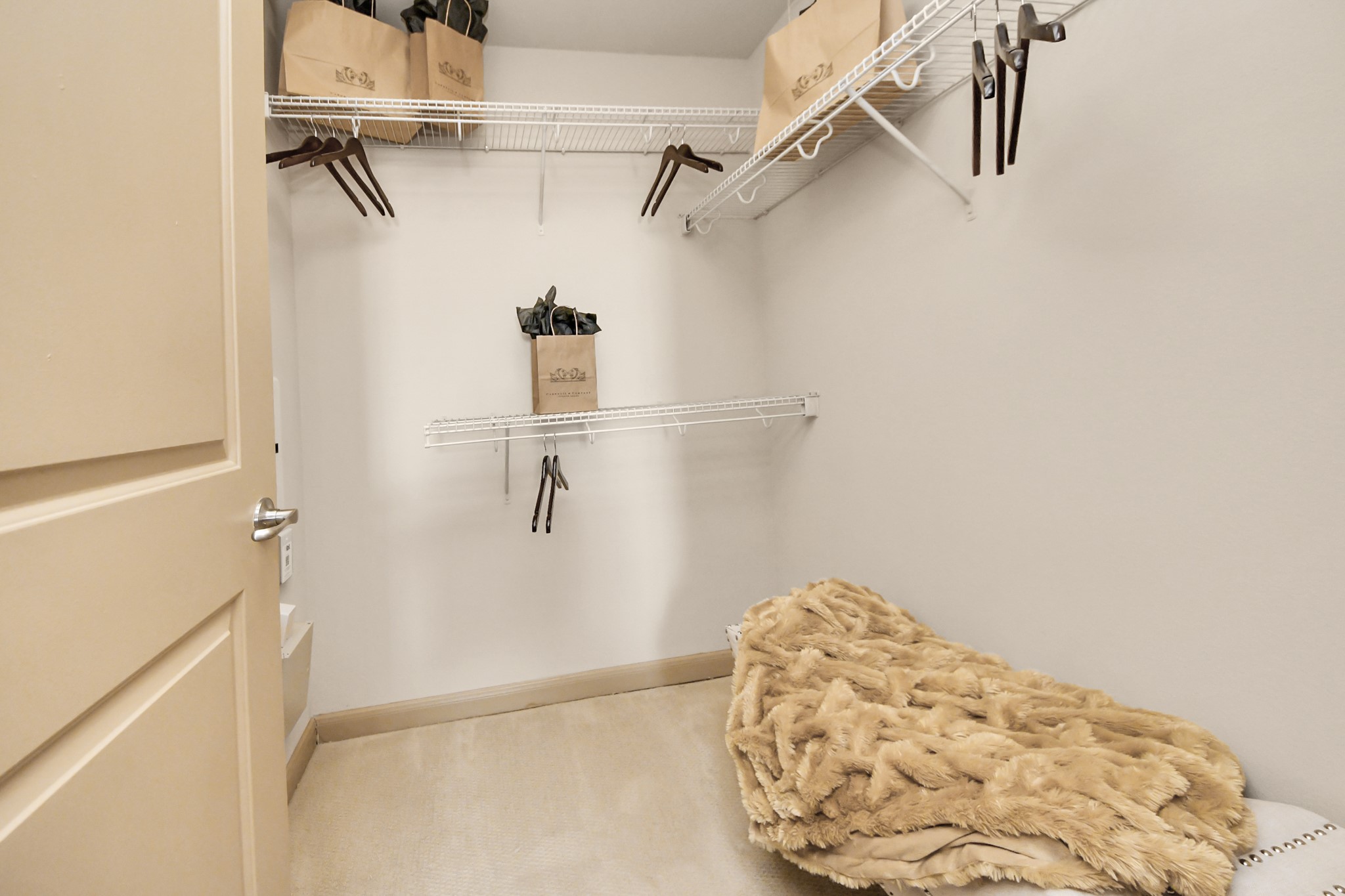 6363 San Felipe Street, Unit 314 Houston, TX 77057 - Photo 22 of 43 a view of small space with racks on the wall