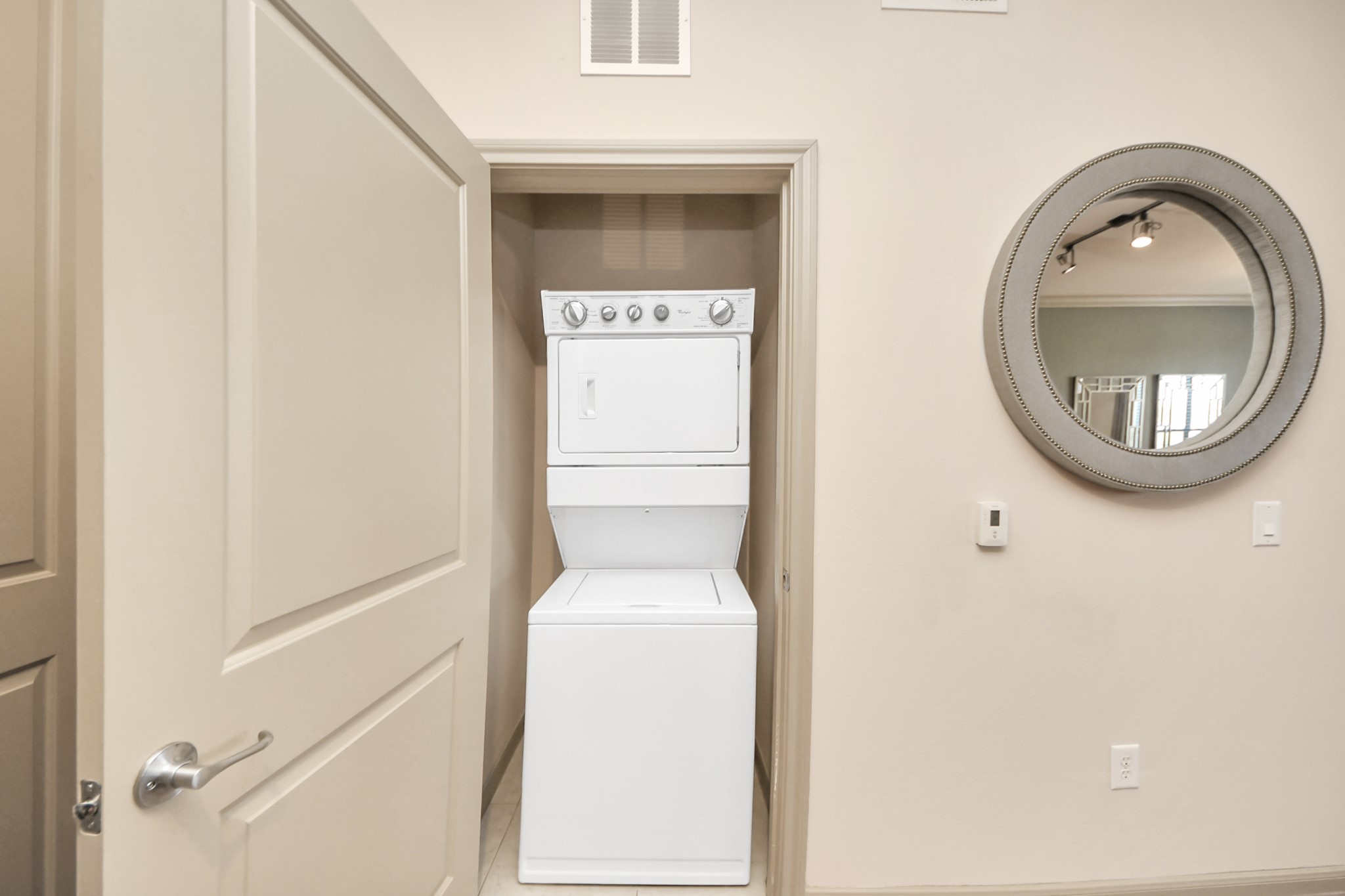 6363 San Felipe Street, Unit 314 Houston, TX 77057 - Photo 25 of 43 a close view of utility room with washer and dryer