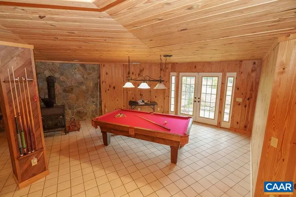 a bathroom with a bathtub and shower