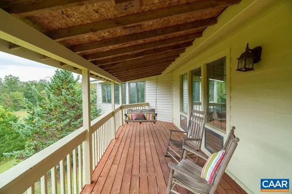 a view of a yard with an outdoor space and seating area