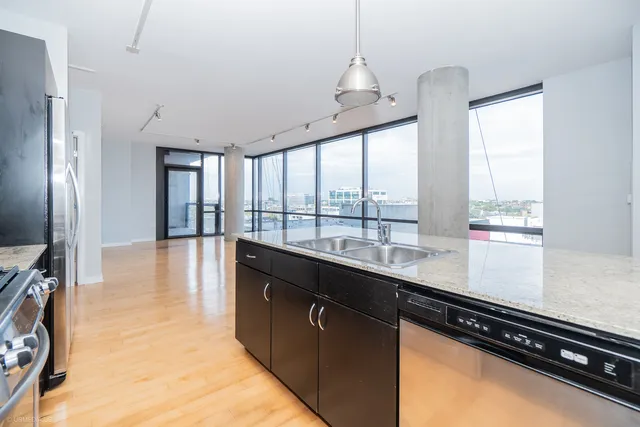 a bathroom with a sink a toilet and a bathtub