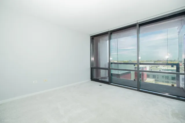 a view of hallway with a large window