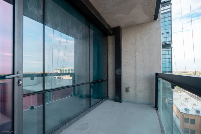 a view of parking garage with cars