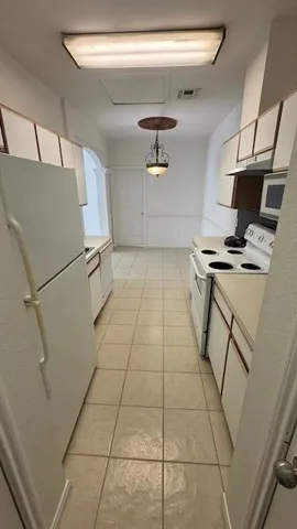 a room with storage and utility