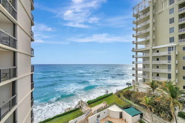a room with furniture pool table and wooden floor